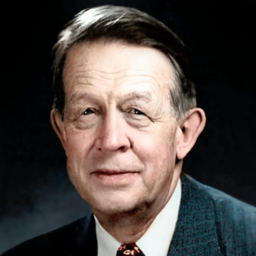 George Estabrooks, a notable figure in psychology, captured in a formal portrait.