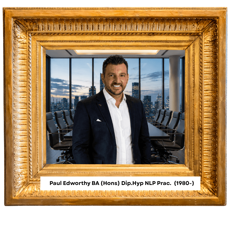 Formal portrait of Paul Edworthy in a dark suit, standing before a meeting room and city skyline at dusk.